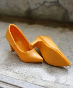 KL Secret Stuff Yellow Pumps